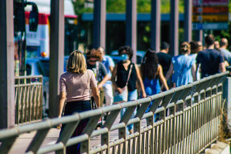 Seville Spain September 18, 2021 Pedestrians walking in the street during the coronavirus outbreak hitting Spain, wearing a mask is not mandatory but most of people wear itのeditorial素材
