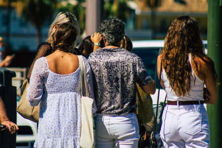 Seville Spain September 18, 2021 Pedestrians walking in the street during the coronavirus outbreak hitting Spain, wearing a mask is not mandatory but most of people wear itのeditorial素材