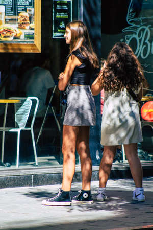 Seville Spain September 18, 2021 Pedestrians walking in the street during the coronavirus outbreak hitting Spain, wearing a mask is not mandatory but most of people wear itのeditorial素材