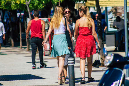 Seville Spain September 18, 2021 Pedestrians walking in the street during the coronavirus outbreak hitting Spain, wearing a mask is not mandatory but most of people wear itのeditorial素材