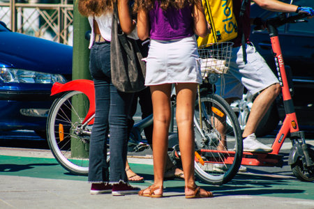 Seville Spain September 18, 2021 Pedestrians walking in the street during the coronavirus outbreak hitting Spain, wearing a mask is not mandatory but most of people wear itのeditorial素材