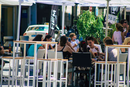 Seville Spain September 18, 2021 Pedestrians walking in the street during the coronavirus outbreak hitting Spain, wearing a mask is not mandatory but most of people wear itのeditorial素材