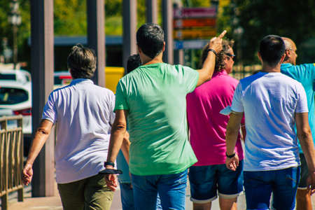 Seville Spain September 18, 2021 Pedestrians walking in the street during the coronavirus outbreak hitting Spain, wearing a mask is not mandatory but most of people wear itのeditorial素材