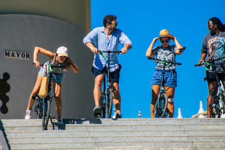Seville Spain September 18, 2021 People rolling with a bicycle in the streets of Seville, an emblematic city and the capital of the region of Andalusia, in the south of Spainのeditorial素材