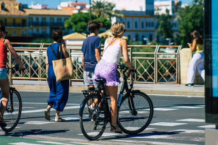 Seville Spain September 18, 2021 People rolling with a bicycle in the streets of Seville, an emblematic city and the capital of the region of Andalusia, in the south of Spainのeditorial素材