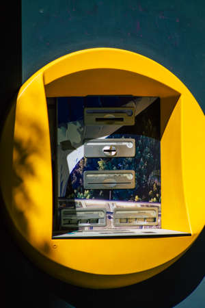 Seville Spain September 18, 2021 ATM located in the streets of Seville, an emblematic city and the capital of the region of Andalusia, in the south of Spainのeditorial素材