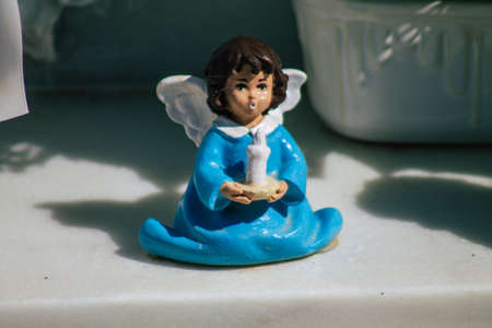 Seville Spain September 21, 2021 Typical graves in a Christian cemetery of the municipality of Carmona in Andalusia in southern Spain, the graves are made in the depth of a wall and richly decoratedのeditorial素材