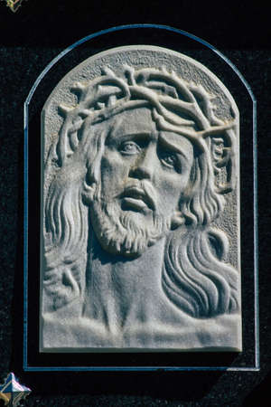 Seville Spain September 21, 2021 Typical graves in a Christian cemetery of the municipality of Carmona in Andalusia in southern Spain, the graves are made in the depth of a wall and richly decoratedのeditorial素材