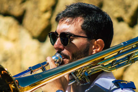 Carmona Spain September 26, 2021 Focus of members of a local music orchestra playing music in the streets of Carmona during the coronavirus epidemic hitting Spainのeditorial素材