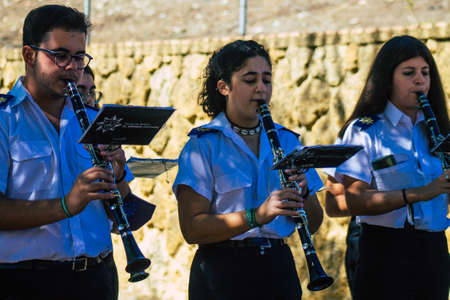 Carmona Spain September 26, 2021 Focus of members of a local music orchestra playing music in the streets of Carmona during the coronavirus epidemic hitting Spainのeditorial素材