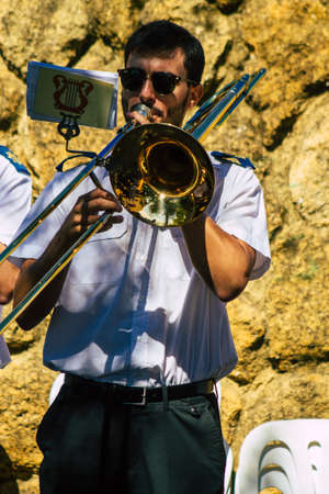 Carmona Spain September 26, 2021 Focus of members of a local music orchestra playing music in the streets of Carmona during the coronavirus epidemic hitting Spainのeditorial素材