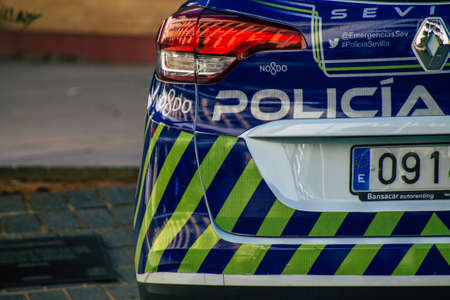 Seville Spain September 18, 2021 Police car patrolling in the streets of Seville during the coronavirus outbreak hitting Spain, wearing a mask in the street is not mandatoryのeditorial素材