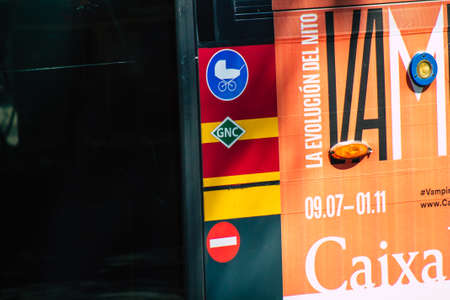 Seville Spain September 18, 2021 Bus driving through the streets of Seville during the coronavirus outbreak hitting Spain, wearing a mask is mandatoryのeditorial素材