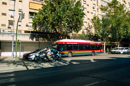 Seville Spain September 18, 2021 Bus driving through the streets of Seville during the coronavirus outbreak hitting Spain, wearing a mask is mandatoryのeditorial素材