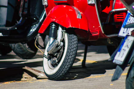 Seville Spain September 18, 2021 Motorcycles parked in the streets of Seville, an emblematic city and the capital of the region of Andalusia, in the south of Spainのeditorial素材
