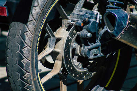 Seville Spain September 18, 2021 Motorcycles parked in the streets of Seville, an emblematic city and the capital of the region of Andalusia, in the south of Spainのeditorial素材