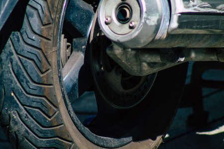 Seville Spain September 18, 2021 Motorcycles parked in the streets of Seville, an emblematic city and the capital of the region of Andalusia, in the south of Spainのeditorial素材