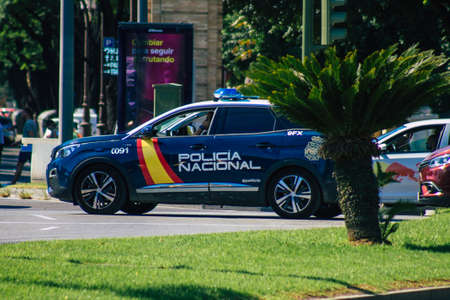 Seville Spain September 22, 2021 Police car patrolling in the streets of Seville during the coronavirus outbreak hitting Spain, wearing a mask in the street is not mandatoryのeditorial素材