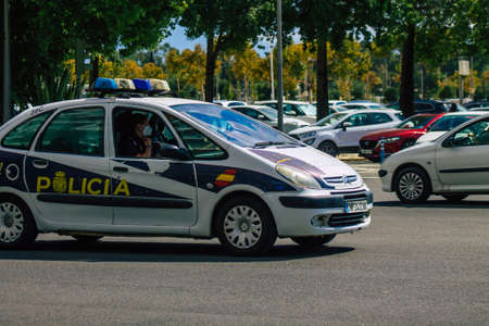 Seville Spain September 22, 2021 Police car patrolling in the streets of Seville during the coronavirus outbreak hitting Spain, wearing a mask in the street is not mandatoryのeditorial素材