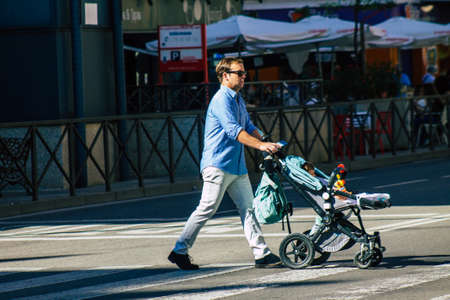 Seville Spain September 18, 2021 Pedestrians walking in the street during the coronavirus outbreak hitting Spain, wearing a mask is not mandatory but most of people wear itのeditorial素材