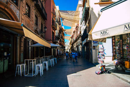 Seville Spain September 18, 2021 Pedestrians walking in the street during the coronavirus outbreak hitting Spain, wearing a mask is not mandatory but most of people wear itのeditorial素材