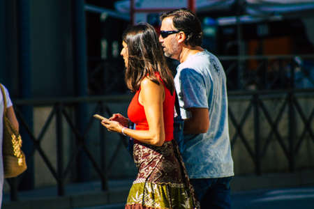 Seville Spain September 18, 2021 Pedestrians walking in the street during the coronavirus outbreak hitting Spain, wearing a mask is not mandatory but most of people wear itのeditorial素材