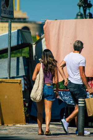 Seville Spain September 18, 2021 Pedestrians walking in the street during the coronavirus outbreak hitting Spain, wearing a mask is not mandatory but most of people wear itのeditorial素材