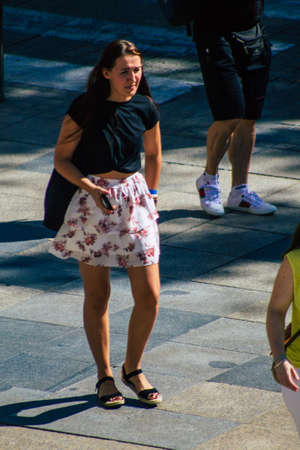 Seville Spain September 18, 2021 Pedestrians walking in the street during the coronavirus outbreak hitting Spain, wearing a mask is not mandatory but most of people wear itのeditorial素材