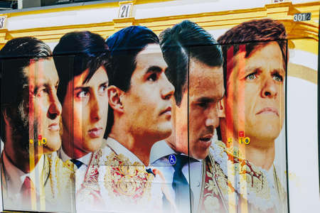 Seville Spain September 04, 2021 Modern electric tram for passengers rolling through the streets of Seville during the coronavirus outbreak hitting Spain, wearing a mask is mandatoryのeditorial素材