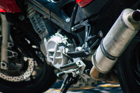 Seville Spain September 04, 2021 Motorcycles parked in the streets of Seville, an emblematic city and the capital of the region of Andalusia, in the south of Spainのeditorial素材