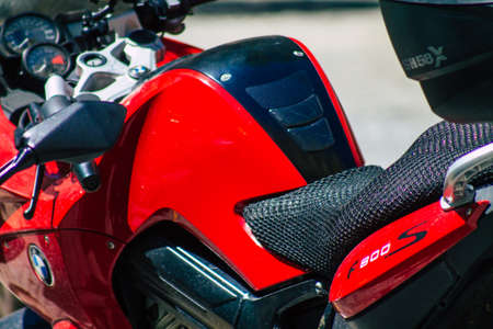 Seville Spain September 04, 2021 Motorcycles parked in the streets of Seville, an emblematic city and the capital of the region of Andalusia, in the south of Spainのeditorial素材