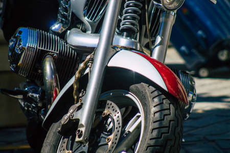 Seville Spain September 04, 2021 Motorcycles parked in the streets of Seville, an emblematic city...