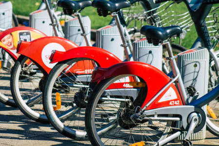 Seville Spain September 04, 2021 Accessible bicycles to hire for short periods of time, usually for a few hours parked in the street and part of the public transport system of Sevilleのeditorial素材