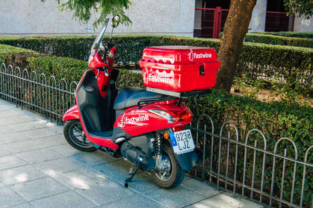 Seville Spain September 04, 2021 Scooters parked in the streets of Seville, an emblematic city and the capital of the region of Andalusia, in the south of Spainのeditorial素材