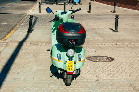 Seville Spain September 04, 2021 Scooters parked in the streets of Seville, an emblematic city and the capital of the region of Andalusia, in the south of Spainのeditorial素材
