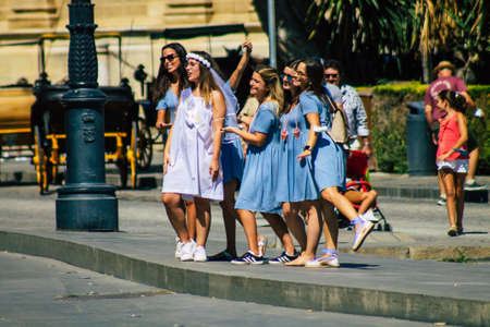 Seville Spain September 18, 2021 Pedestrians walking in the street during the coronavirus outbreak hitting Spain, wearing a mask is not mandatory but most of people wear itのeditorial素材