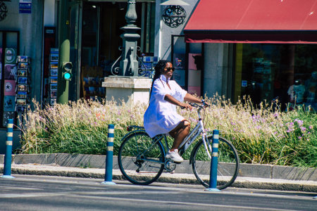 Seville Spain September 04, 2021 People rolling with a bicycle in the streets of Seville, an emblematic city and the capital of the region of Andalusia, in the south of Spainのeditorial素材