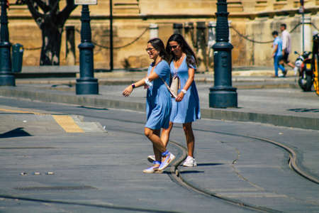 Seville Spain September 18, 2021 Pedestrians walking in the street during the coronavirus outbreak hitting Spain, wearing a mask is not mandatory but most of people wear itのeditorial素材
