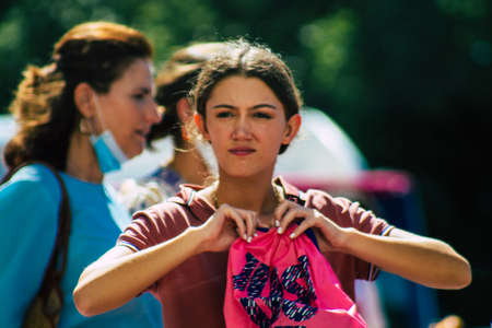 Seville Spain September 18, 2021 Pedestrians walking in the street during the coronavirus outbreak hitting Spain, wearing a mask is not mandatory but most of people wear itのeditorial素材