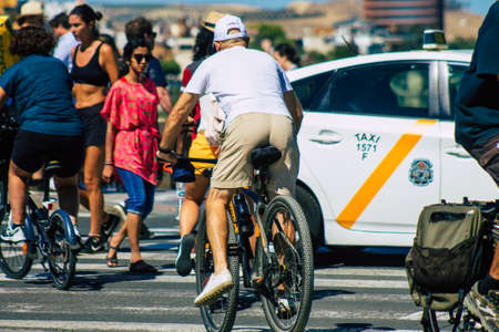 Seville Spain September 18, 2021 People rolling with a bicycle in the streets of Seville, an emblematic city and the capital of the region of Andalusia, in the south of Spainのeditorial素材