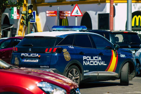 Seville Spain September 18, 2021 Police car patrolling in the streets of Seville during the coronavirus outbreak hitting Spain, wearing a mask in the street is not mandatoryのeditorial素材