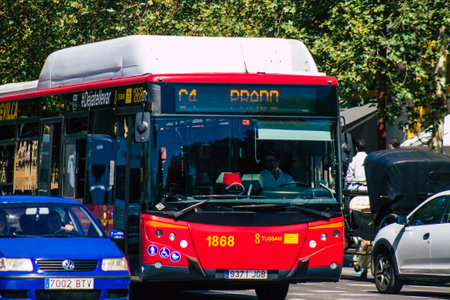 Seville Spain September 18, 2021 Bus driving through the streets of Seville during the coronavirus outbreak hitting Spain, wearing a mask is mandatoryのeditorial素材
