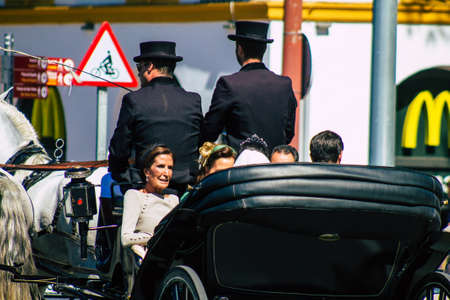 Seville Spain September 18, 2021 Horse drawn carriage ride through the streets of Seville during the coronavirus outbreak hitting Spain, wearing a mask is mandatoryのeditorial素材