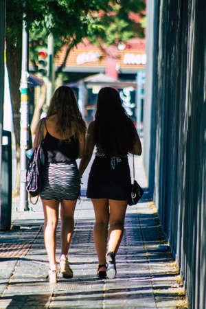 Seville Spain September 18, 2021 Pedestrians walking in the street during the coronavirus outbreak hitting Spain, wearing a mask is not mandatory but most of people wear itのeditorial素材
