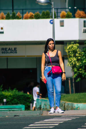 Seville Spain September 18, 2021 Pedestrians walking in the street during the coronavirus outbreak hitting Spain, wearing a mask is not mandatory but most of people wear itのeditorial素材