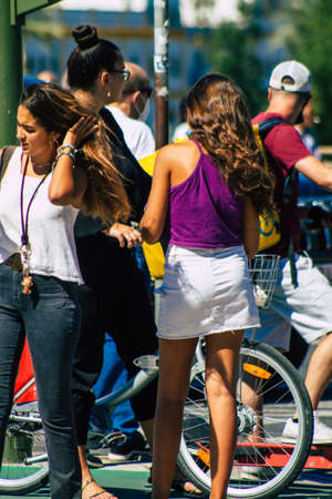 Seville Spain September 18, 2021 Pedestrians walking in the street during the coronavirus outbreak hitting Spain, wearing a mask is not mandatory but most of people wear itのeditorial素材