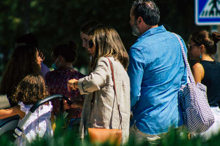 Seville Spain September 18, 2021 Pedestrians walking in the street during the coronavirus outbreak hitting Spain, wearing a mask is not mandatory but most of people wear itのeditorial素材