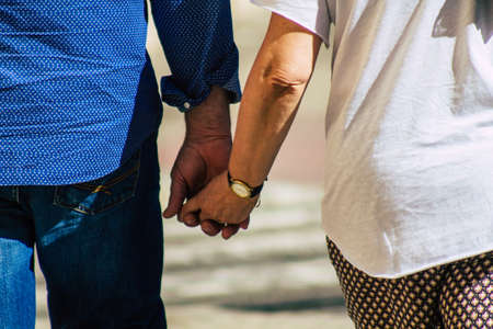 Seville Spain September 18, 2021 Pedestrians walking in the street during the coronavirus outbreak hitting Spain, wearing a mask is not mandatory but most of people wear itのeditorial素材