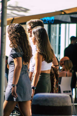 Seville Spain September 18, 2021 Pedestrians walking in the street during the coronavirus outbreak hitting Spain, wearing a mask is not mandatory but most of people wear itのeditorial素材