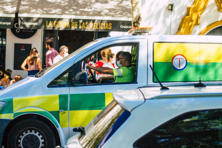 Seville Spain September 18, 2021 Ambulance driving through the streets of Seville during the coronavirus outbreak hitting Spain, wearing a mask is mandatoryのeditorial素材